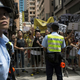 Occupy Central supporters shout to pro-Beijing protesters as they march in the streets to demonstrate against a pro-democracy Occupy Central campaign in Hong Kong August 17, 2014.